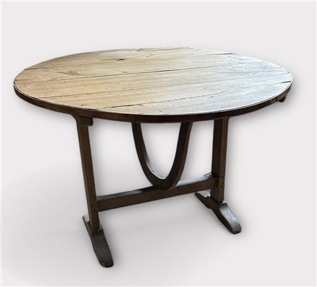 A vineyard table. France ca. 1900. H.:70 x Diam. 90 cm. Removable top.