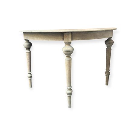 A demi-lune wall table, bleached and with grey wash. H.: 75 cm. Width: 118 cm.