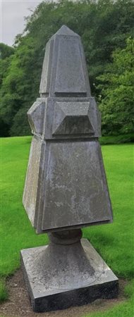 A stone obelisk shaped garden ornament or pinnacle. Height including base:...