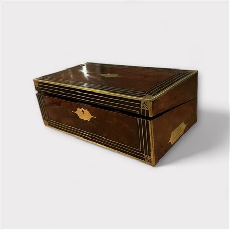 A 19th century writing box with inlaid brass and provided with a 'secret'...