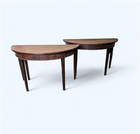 A set of (2) mahogany veneered demi-lune wall tables, ca. 1900. 72 x 110 x 55...