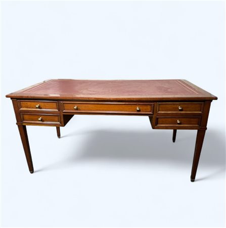 A hardwood desk flat with red leather inlay, 20th century. 80 x 160 x 80 cm.