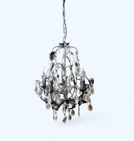 A brass chandelier with glass icicles, 20th century. 60 x 40 cm.