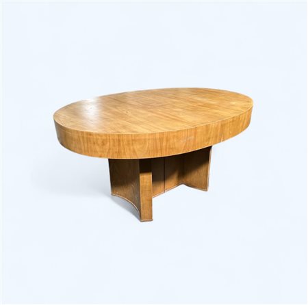 A birch veneered oval art deco side table H.: 79 x 152 x 112 cm.