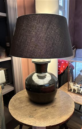 A large black glazed earthenware table lamp with an anthracite shade. 75 x...