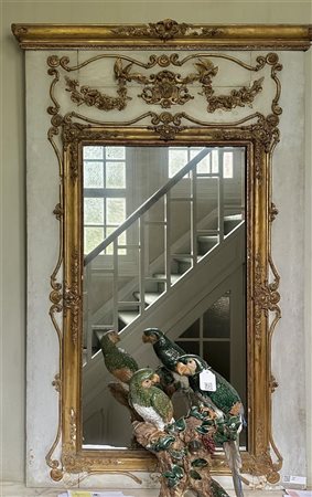 A Louis XV mantelpiece mirror with old glass, early 18th century. 200 x 140 cm.