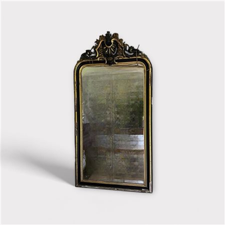 A large mantel mirror, ca. 1800. (defects to ornaments). 140 x 90 cm.