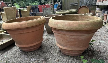 A pair of large, hard-fired, Tuscan terracotta garden vases, marked on the...