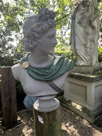 A polychrome (green and gold) bust of the Apollo Belvedere. Height: 83 cm.