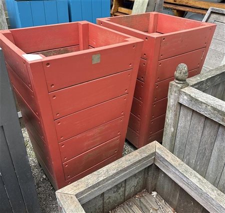 A lot of (2) identical, red lacquered teak planters. A low floor has been...