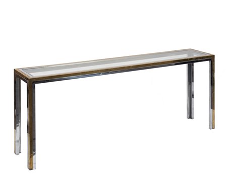  
Console 1970 - 74
Ottone, acciaio cromato, vetro Cm 73 (h) x 185 x 35