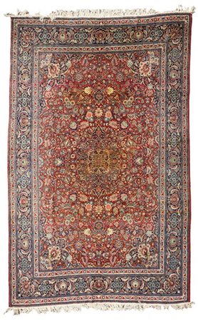 Tappeto Keshan, Persia, secolo XX. Decoro floreale con medaglione con puntali a