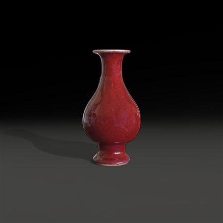 A small balauster ox blood Chinese vase