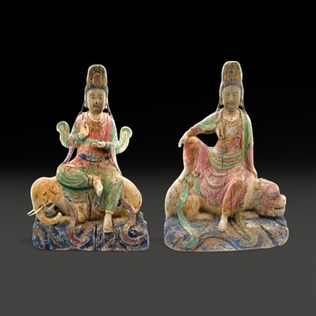 A pair of Chinese wooden sculptures