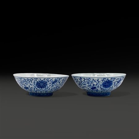 A pair of blue and white bowls