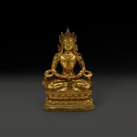 A Chinese gilt-bronze Buddha