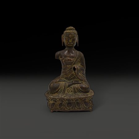 A Tibetan bronze repousse Buddha