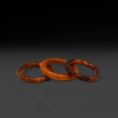 Three Chinese amber bangles