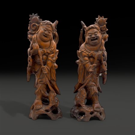 A pair of Chinese hardwood carvings