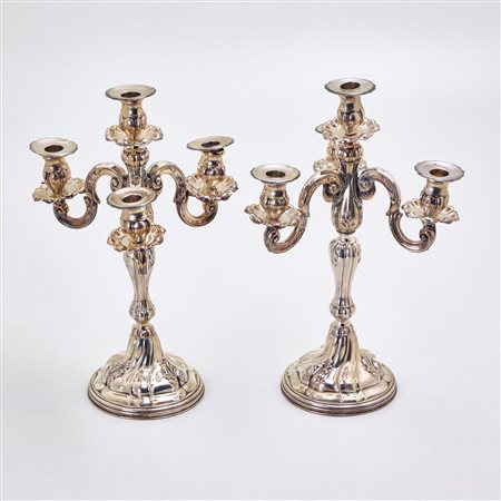  
Coppia di candelabri in argento 
 