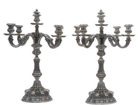  
Coppia di candelabri in arg 800 Manifattura italiana, inizio XX secolo
 48 x 38 cm