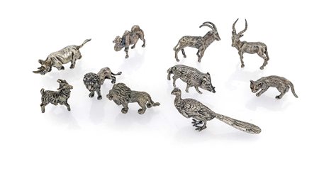 Dieci piccole sculture in argento raffiguranti animali due leoni (cm 3x4...