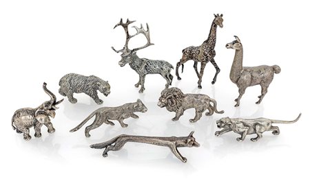 Nove sculture raffiguranti animali in argento cervo (cm 8,5x6,5); giraffa (cm...