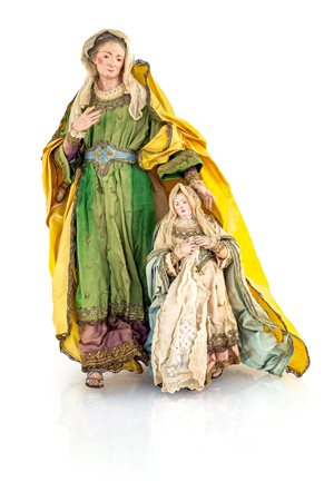 Sant'Anna e Maria bambina la prima abbigliata con lunga tunica viola...