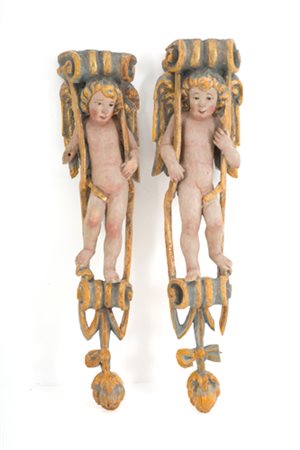 Pair of caryatids with cherubs