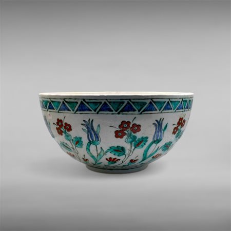 A large Iznik style pottery bowl