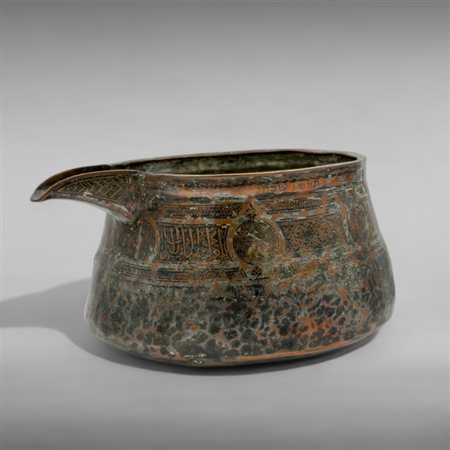 Basin with pouring spout