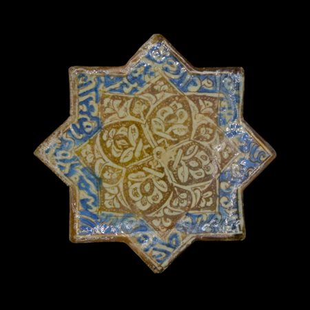 A lustre painted star-shaped tile Ilkhanid