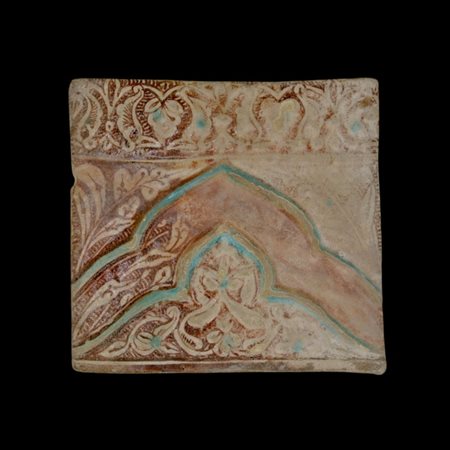 A Kashan moulded lustre tile Ilkhanid