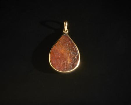 A carnelian (aqiq) talismanic pendant