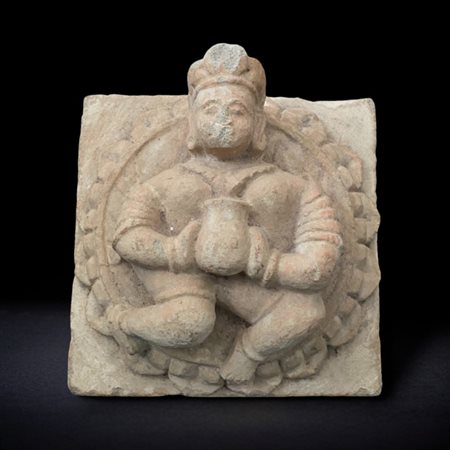 Sandstone sculpture depicting a minor deity