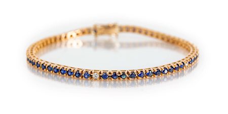 Bracciale tennis in oro, zaffiri e brillanti Oro rosa 750/000. Zaffiri in...