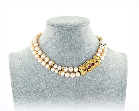 Collana di perle coltivate, oro e brillante Oro giallo 750/000. Perle...