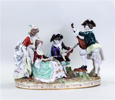 A porcelain group of a musical company, Scheibe Alsbach, one finger damaged....