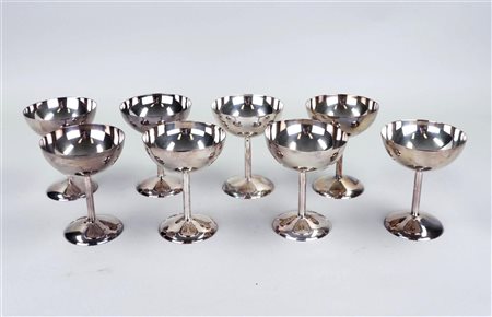 A set of eight silver-plated coupes, marked 'gero 90'.