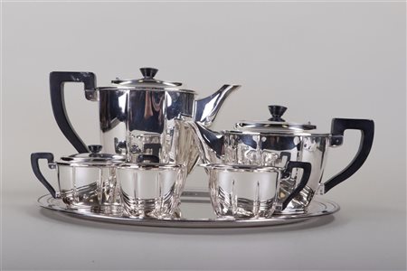 A silver-plated coffee and tea set with tray, cream set and spoon bowl,...