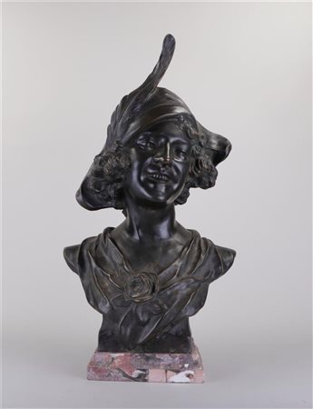 An Art Nouveau bronze bust of a laughing young lady with hat, signed...