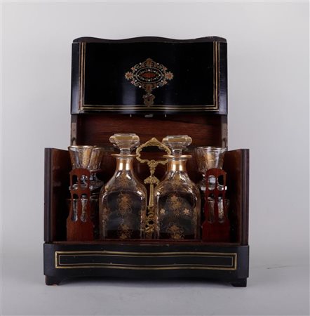 A French Boulle liqueur cellar filled with (8) glasses, and (4) carafes....