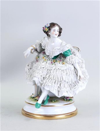 A porcelain figurine of an elegant lady, Germany, marked on the bottom.