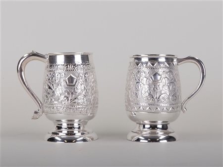 A lot consisting of (2) identical silver drinking cups. 1st grade. Marked on...