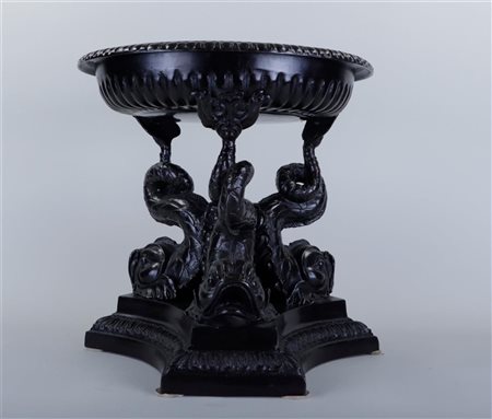 A dark patinated, bronze, renaissance style, fountain carried by dolphins....