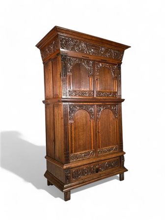 A small size, 17th century Dutch counter cupboard with two doors in both the...