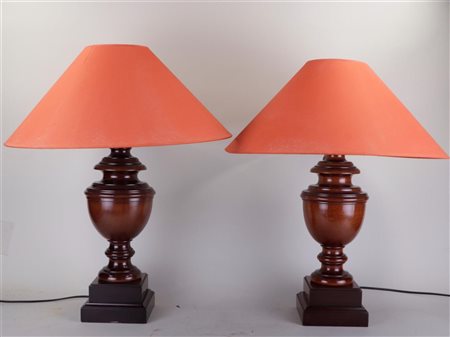 A set of (2) solid mahogany urn-shaped table lamps with red shade. Height: 70...