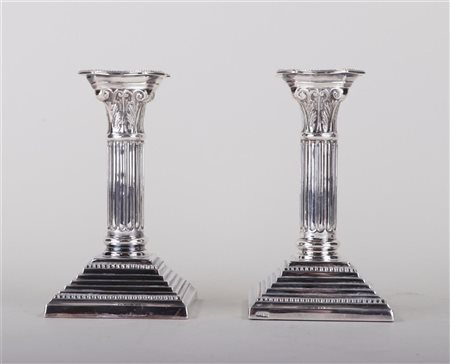 A set of candlesticks in the shape of a Corinthian column, first grade,...