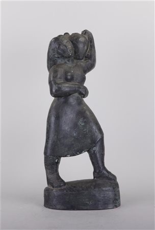 A Spanish pottery statue of a lady.H. 32 cm.