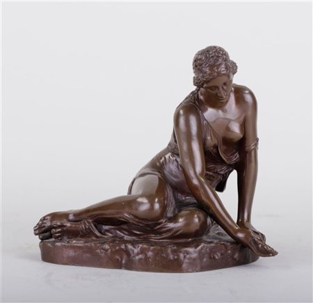 A bronze statue of a young woman with a shell. France 19th century.H.: 13 cm.